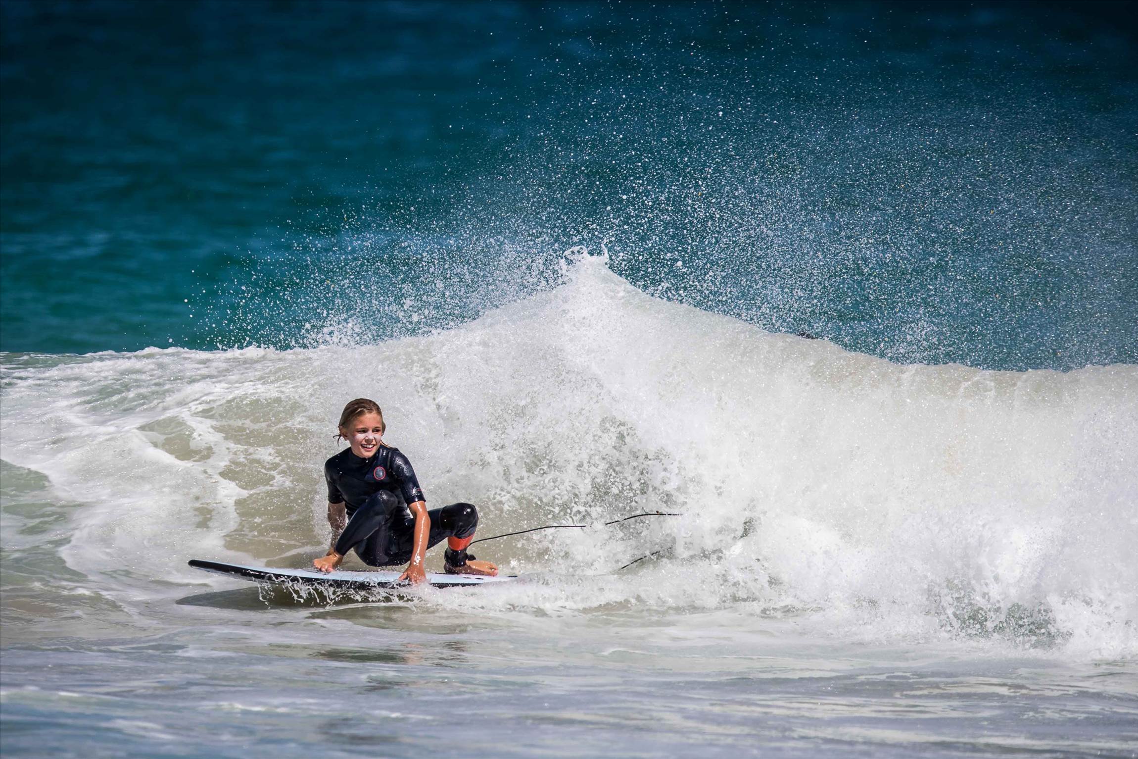 Surfing Trigg Beach, WA